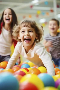 Kids jumping in a colorful inflatable bounce house at a birthday party on the Gold Coast