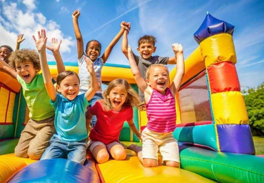 Kids enjoying a colorful jumping castle at a fun-filled bounce party