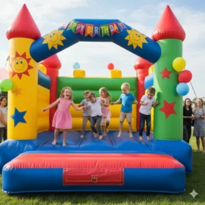 Children playing safely inside a colorful bounce house during a birthday party