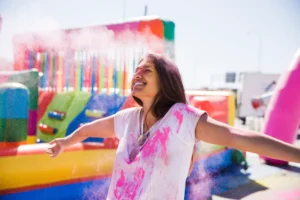 Kids enjoying a bouncing castle at a family event on the Gold Coast